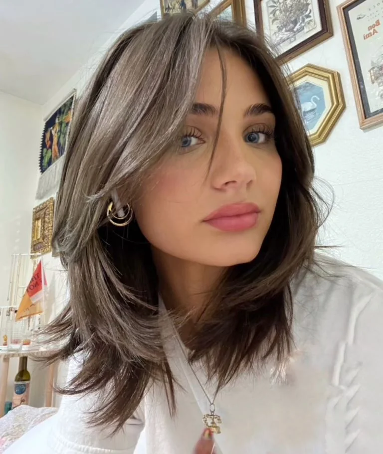 Photo showing butterfly haircut, with the hairstyle clearly visible.