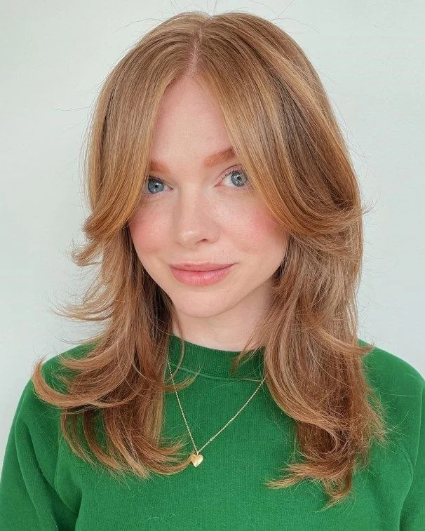 Photo showing ginger hair with bangs, with the hairstyle clearly visible.