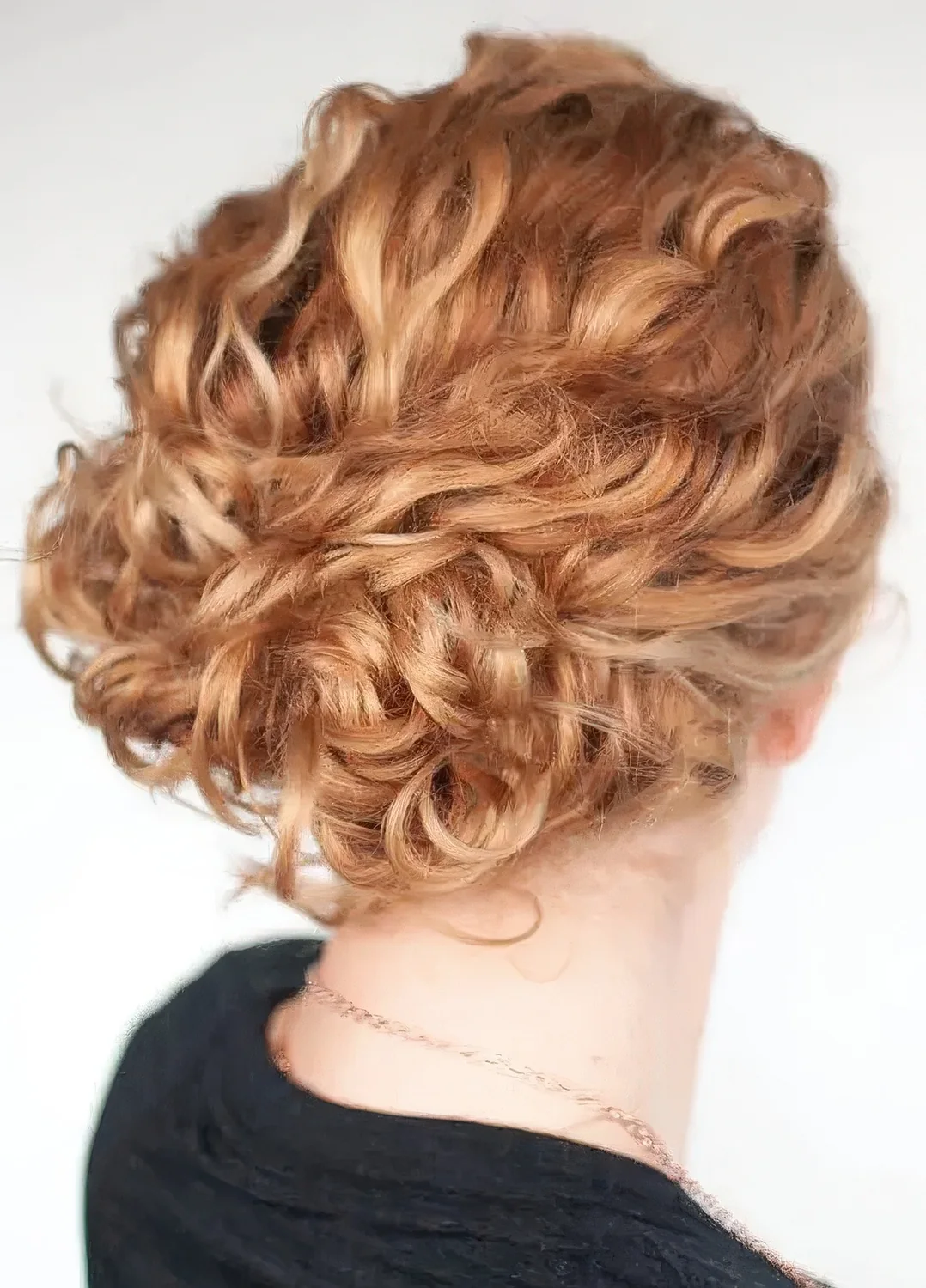 Easy wavy updo with a wavy top and a beautiful ginger shade.