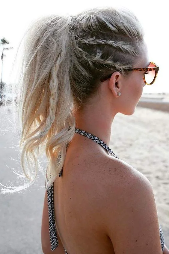 High ponytail with braids on the head and in the tail.