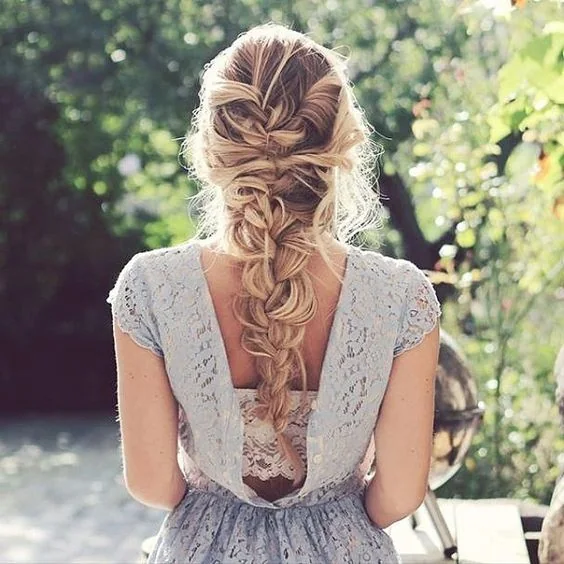 Messy long braid won't make you feel very hot.