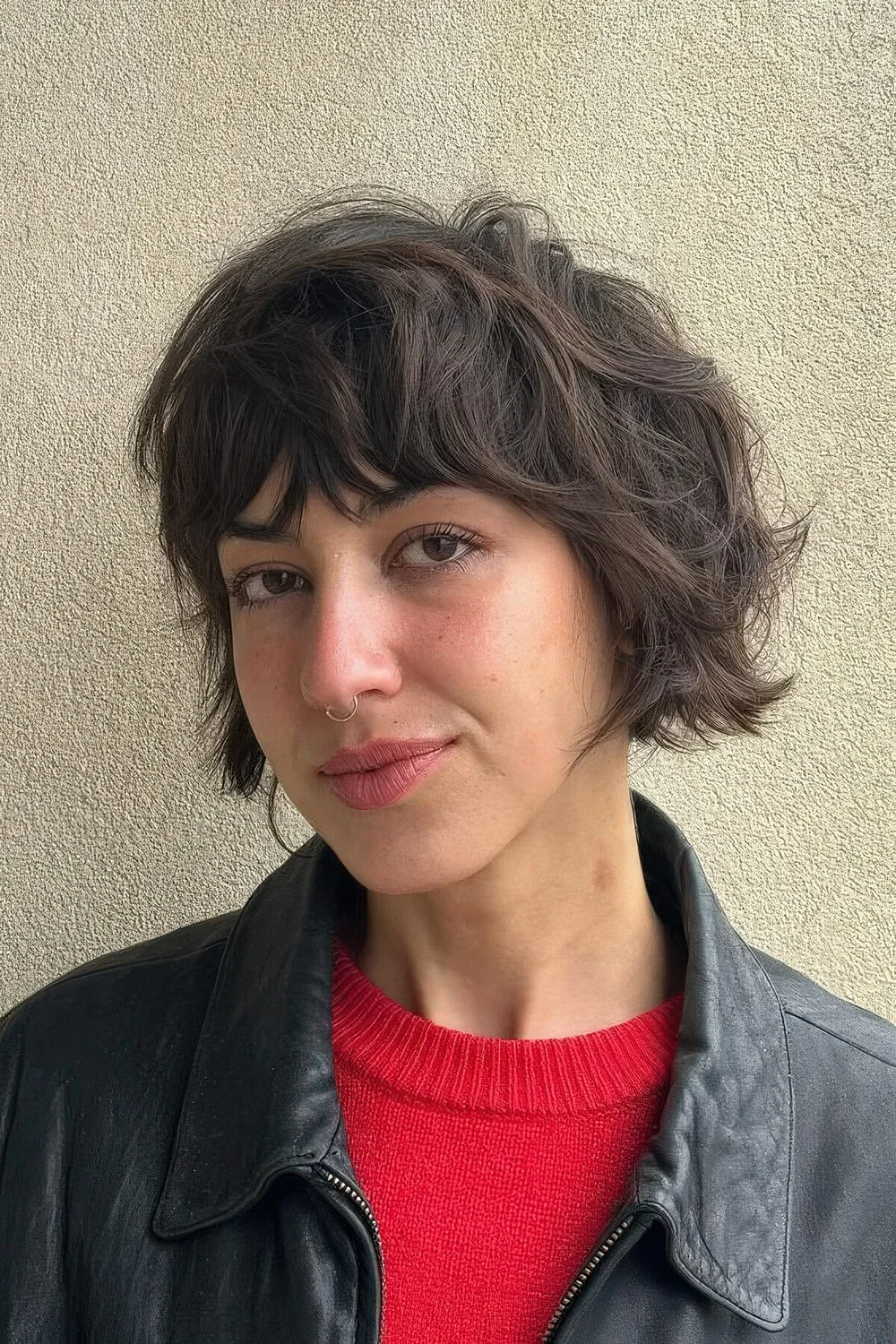 Messy wavy micro bob with a matching fringe.