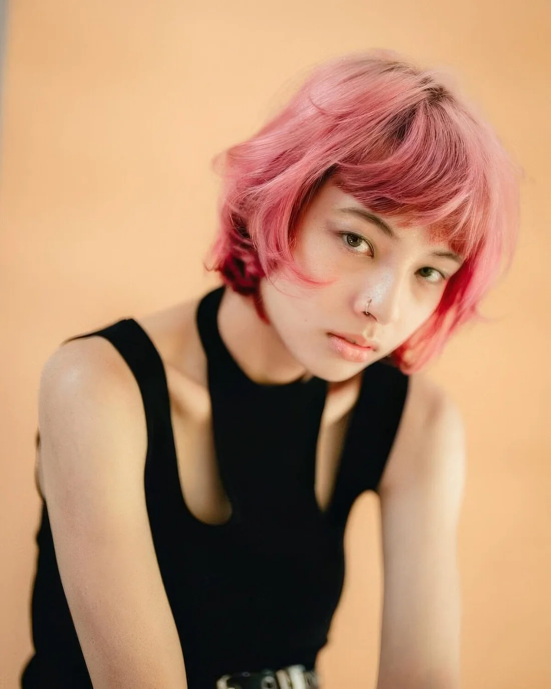 Pink layered French bob with a classic fringe.