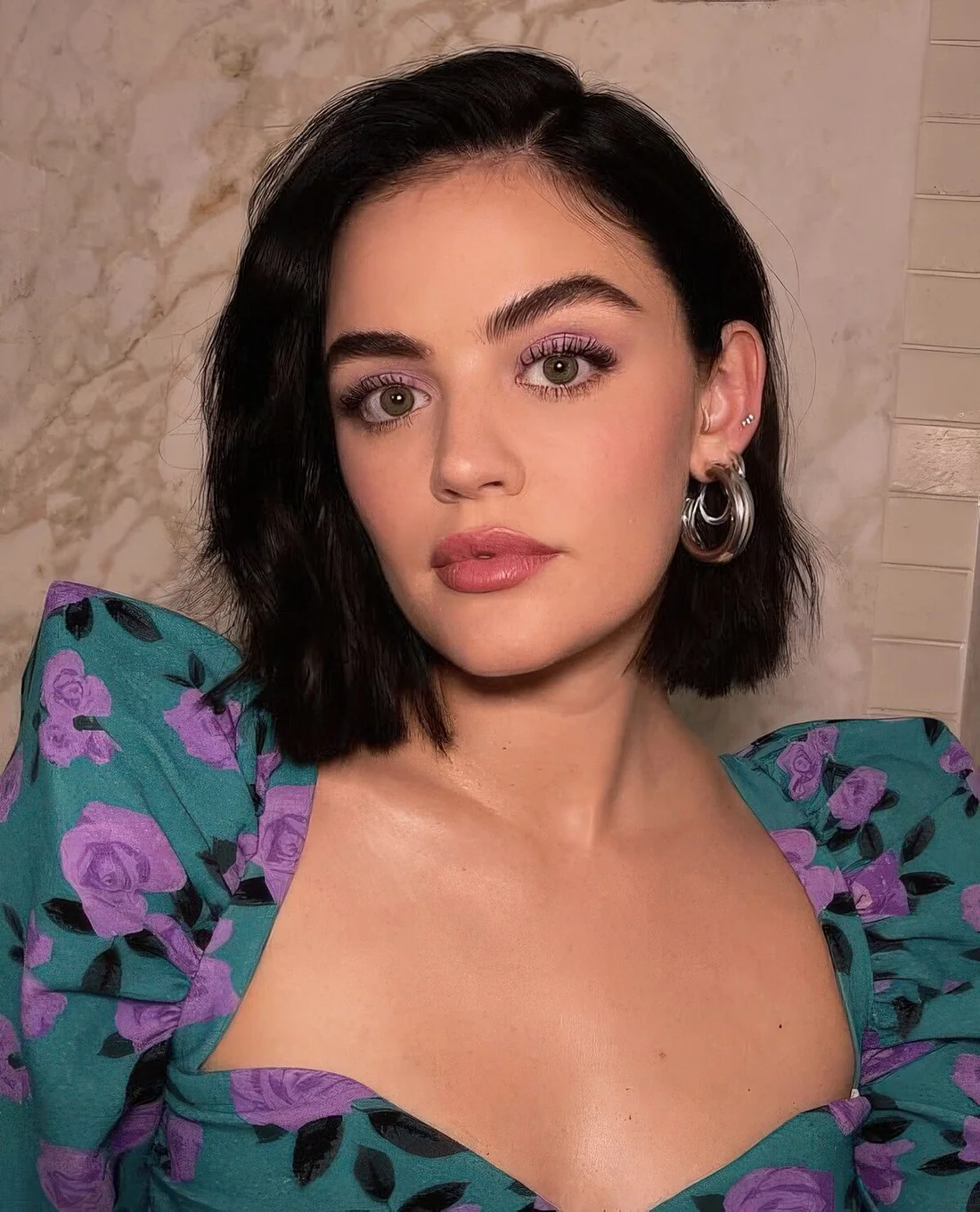 Black wavy midi bob with side part and a lot of texture always.