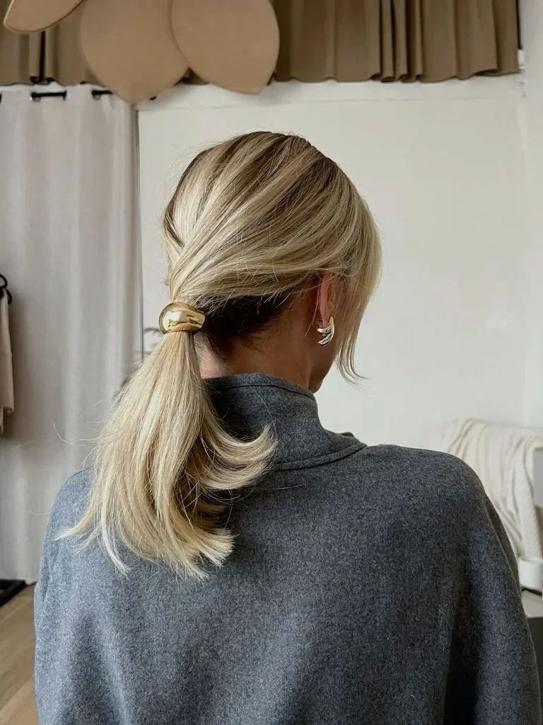 chest straight chestnut ponytail shown as a mother of the bride hairstyles idea