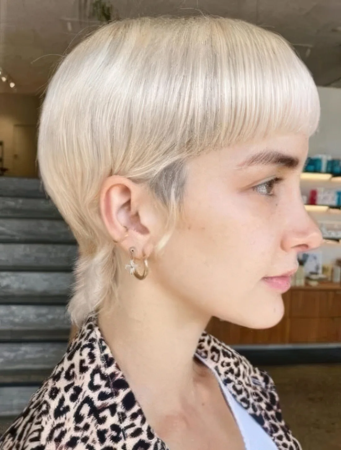 Bowl cut mullet keeping the hair short on the top and sides but longer in the back.