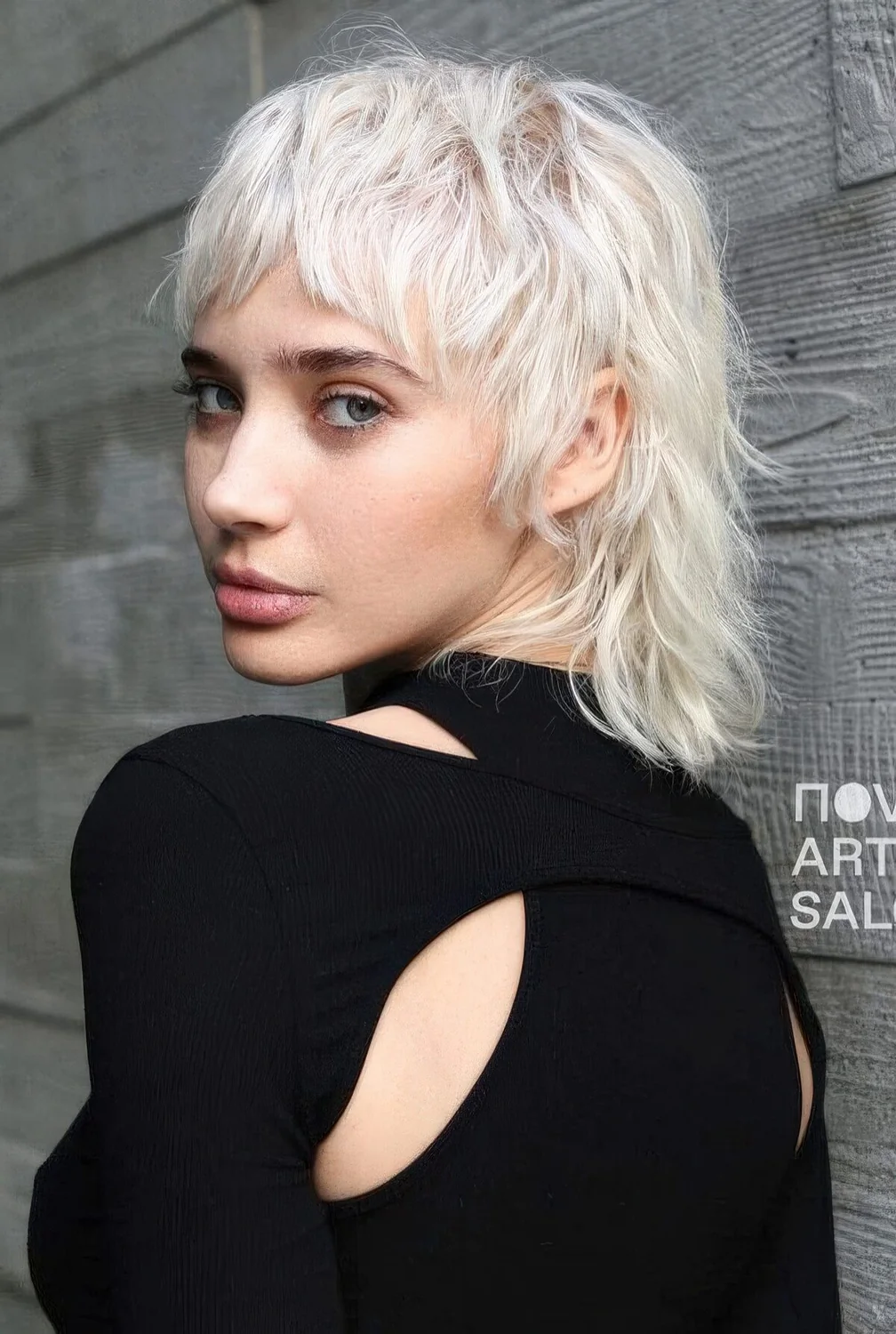 Photo showing icy blonde hairstyle, with the hairstyle clearly visible.