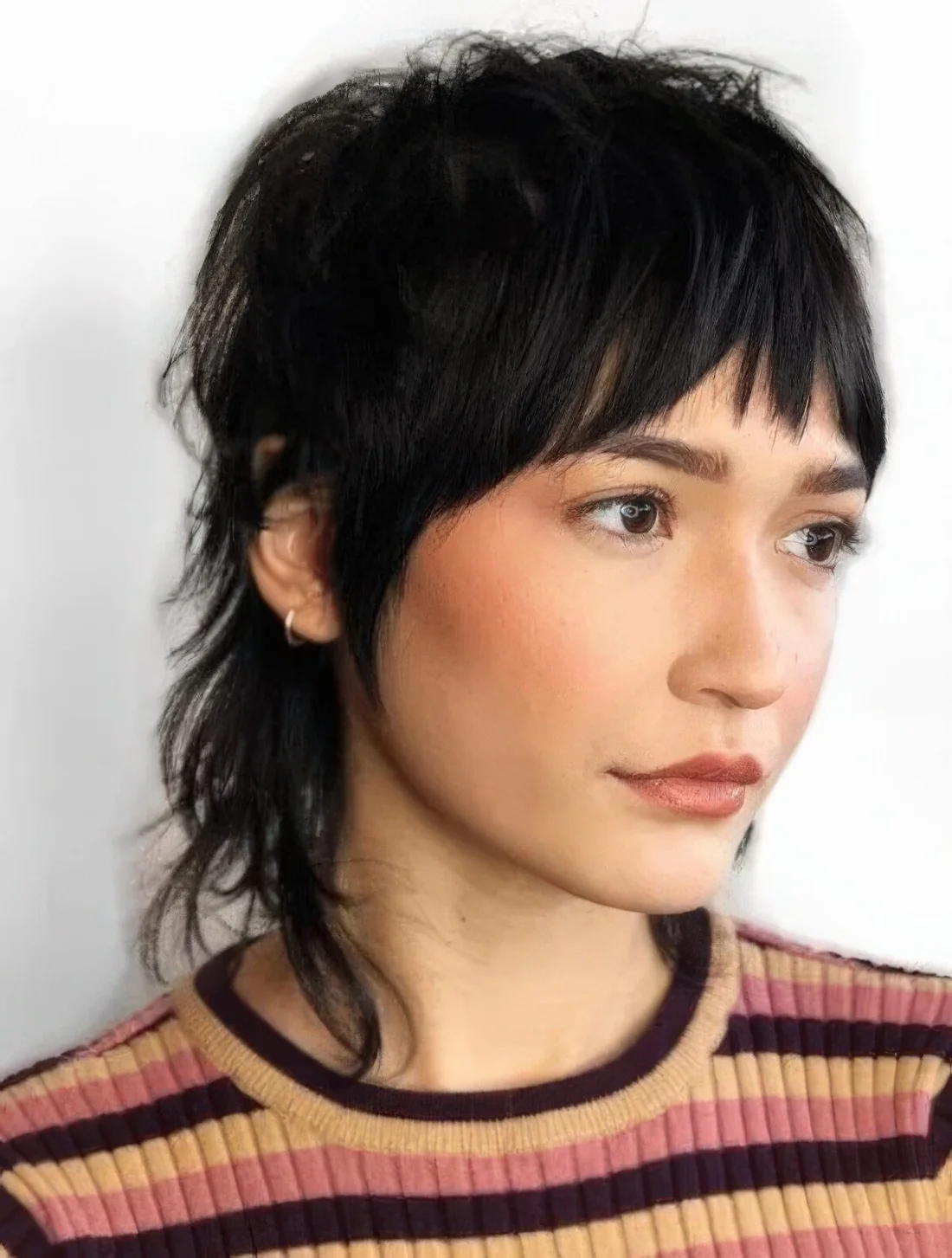 Photo showing straight hair mullet, with the hairstyle clearly visible.