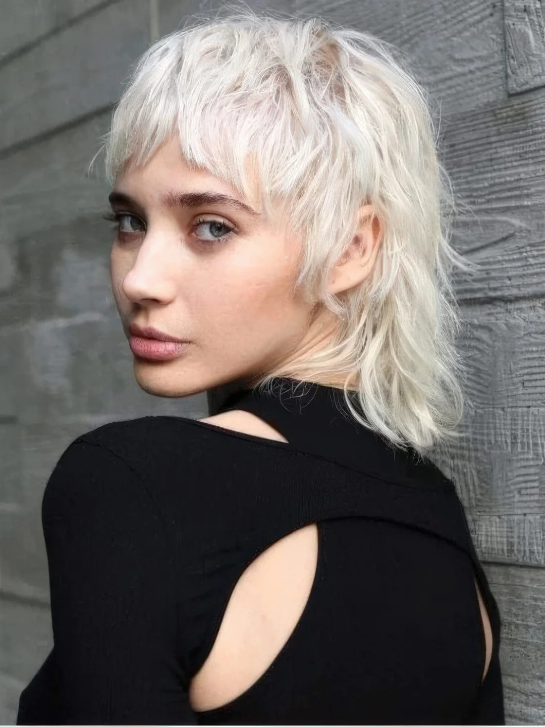 Photo showing modern mullet, with the hairstyle clearly visible.