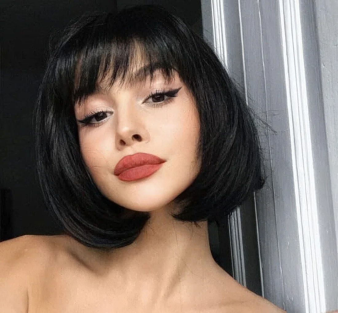 Photo showing black bob wispy bang, with the hairstyle clearly visible.