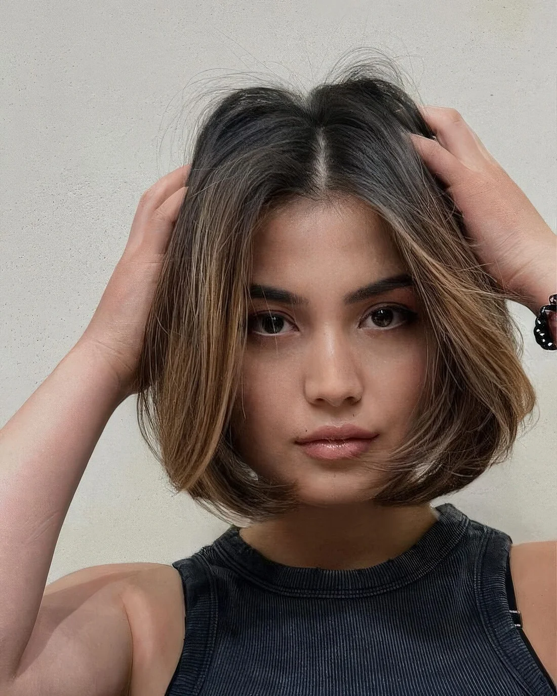 Photo showing blunt chin-length bob, with the hairstyle clearly visible.
