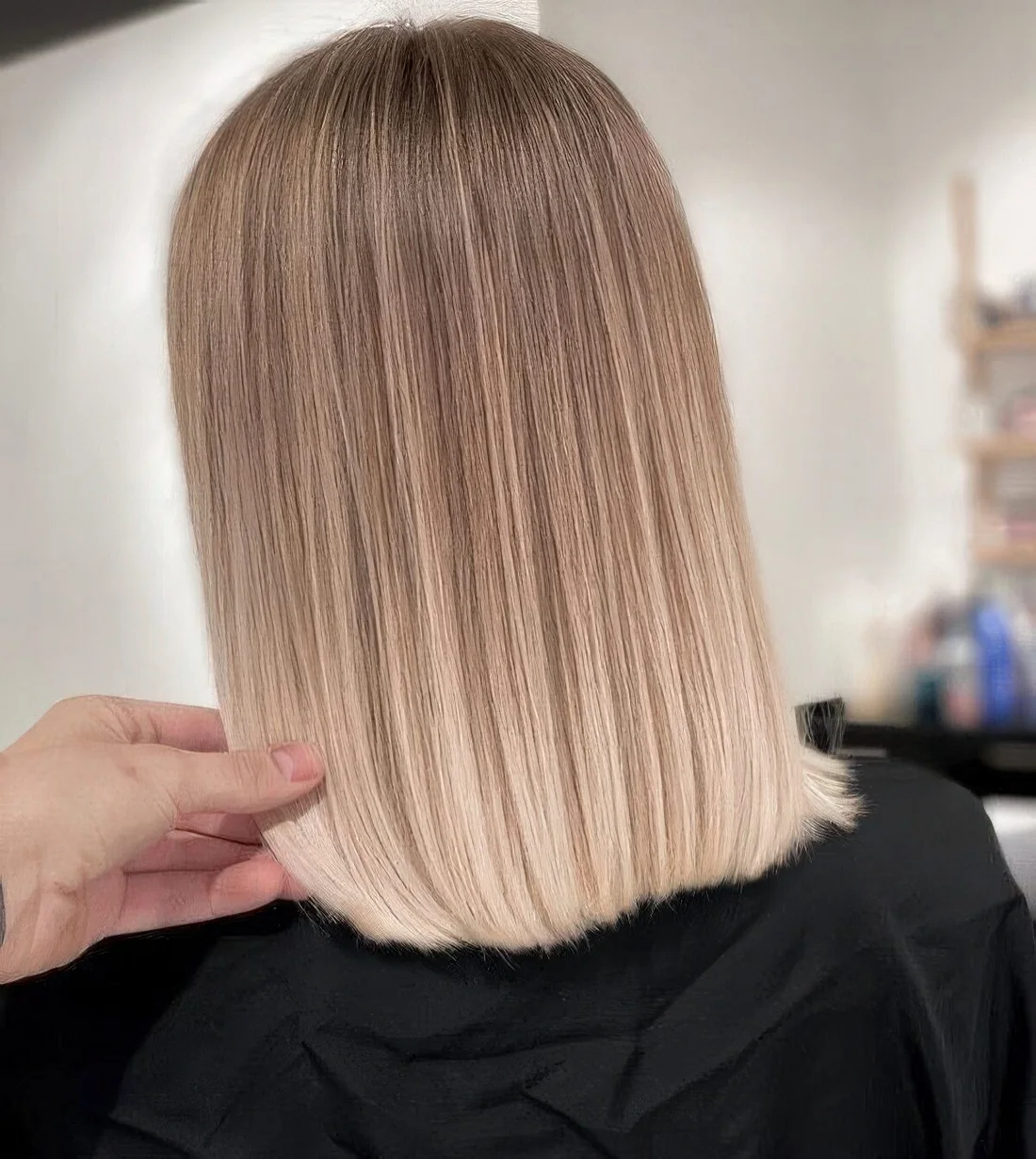 Photo showing blunt bob hairstyle, with the hairstyle clearly visible.