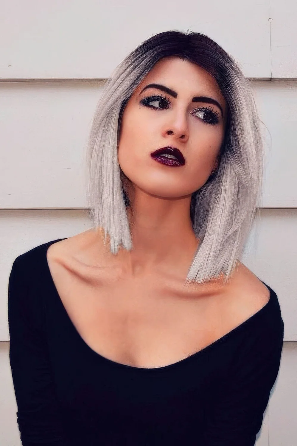 Straight long bob with black to silver blonde.