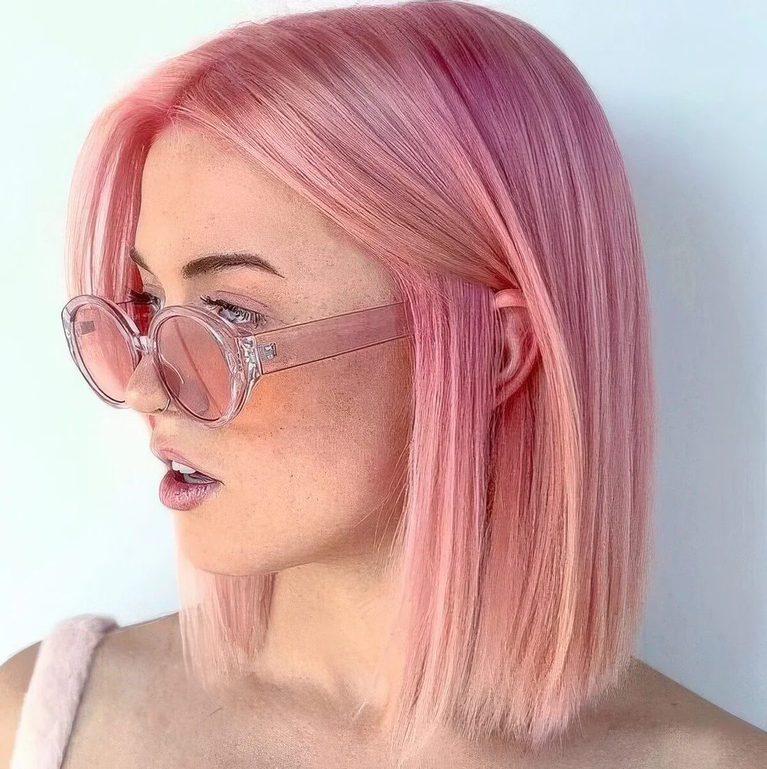 Photo showing ombre pink bob hairstyle, with the hairstyle clearly visible.