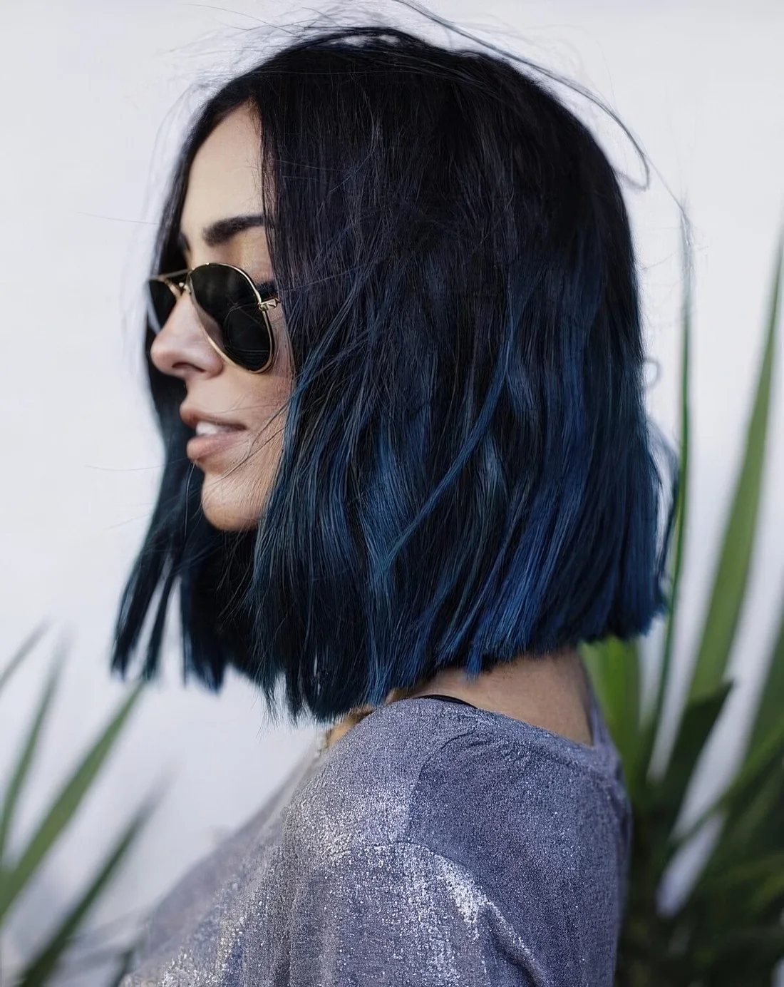 Long textural bob with a black to blue ombre for a super edgy look.