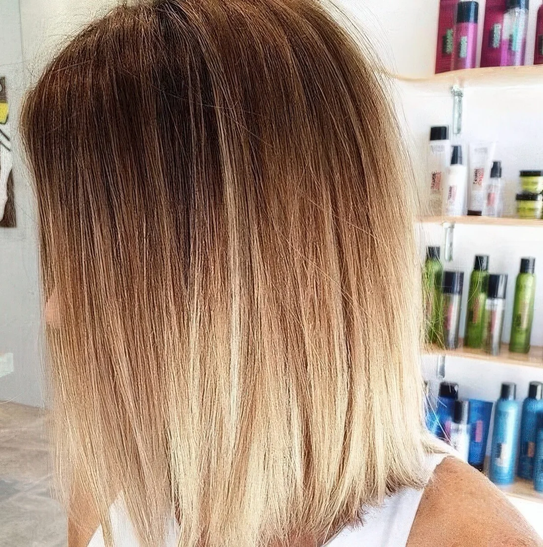 Textural long bob from brunette to blonde.
