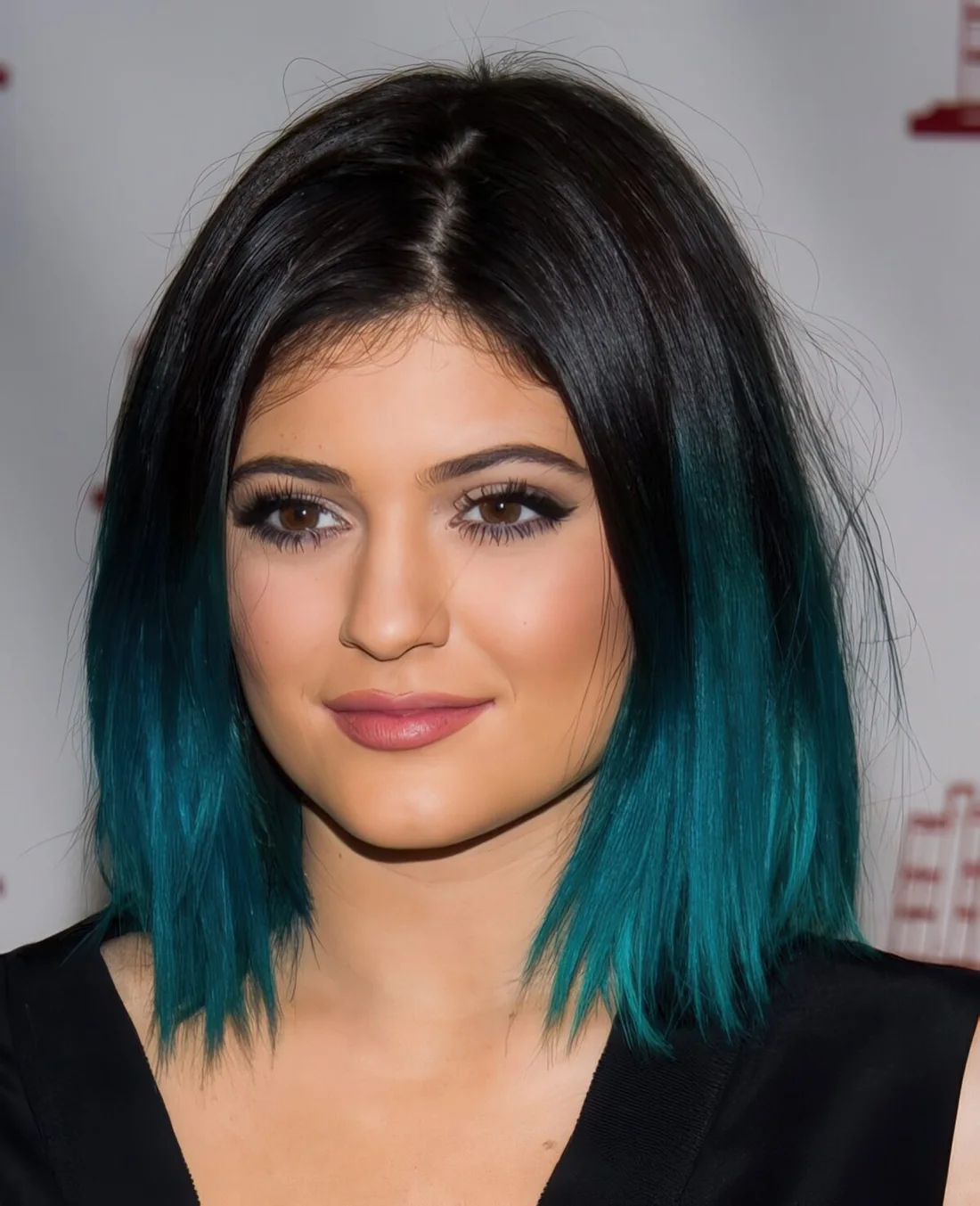 Black root with turquoise ombre for a super bold look.