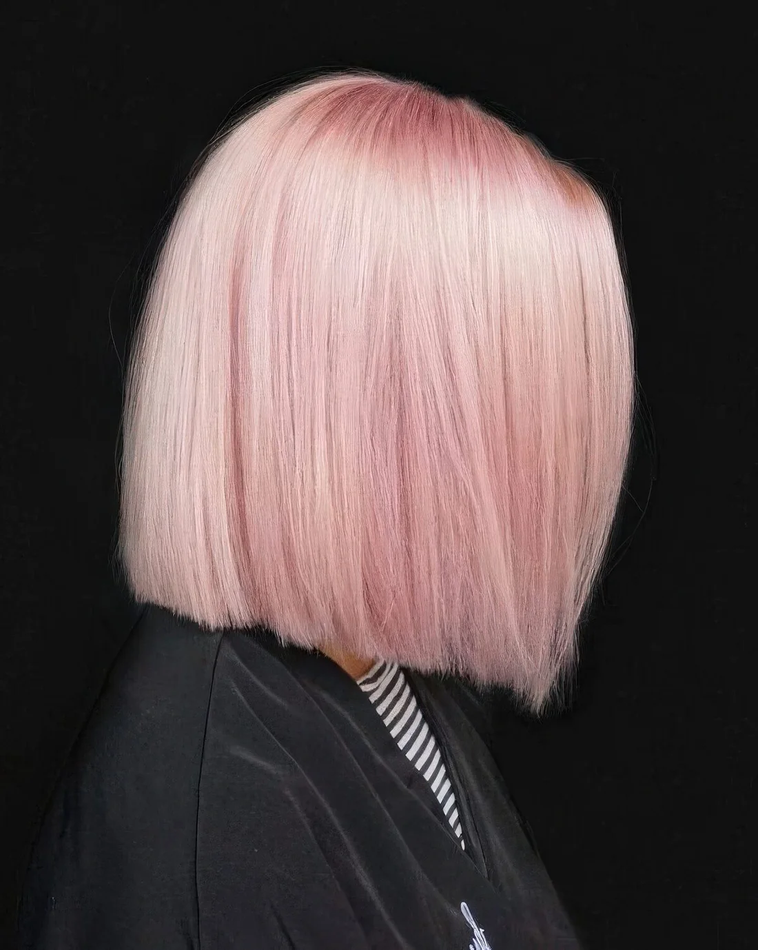 Light pink straight long bob with shiny and chic hair.