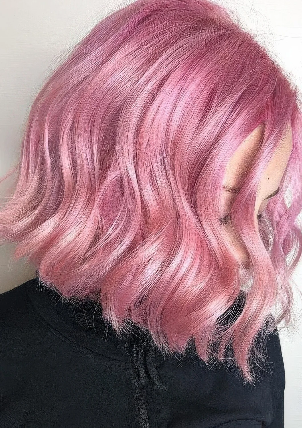 Photo showing pink bob hairstyle, with the hairstyle clearly visible.