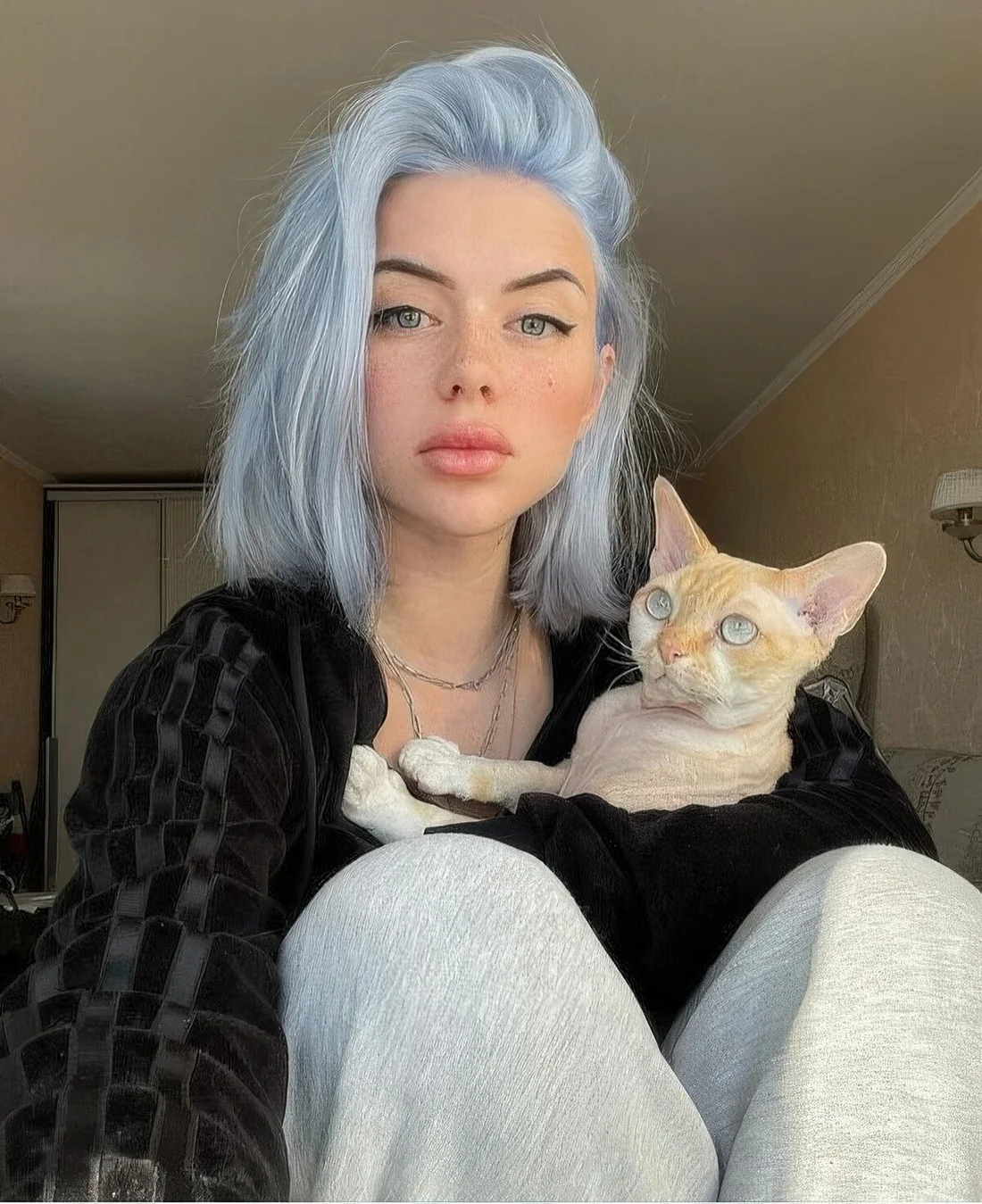Photo showing mermaid blue bob hairstyle, with the hairstyle clearly visible.