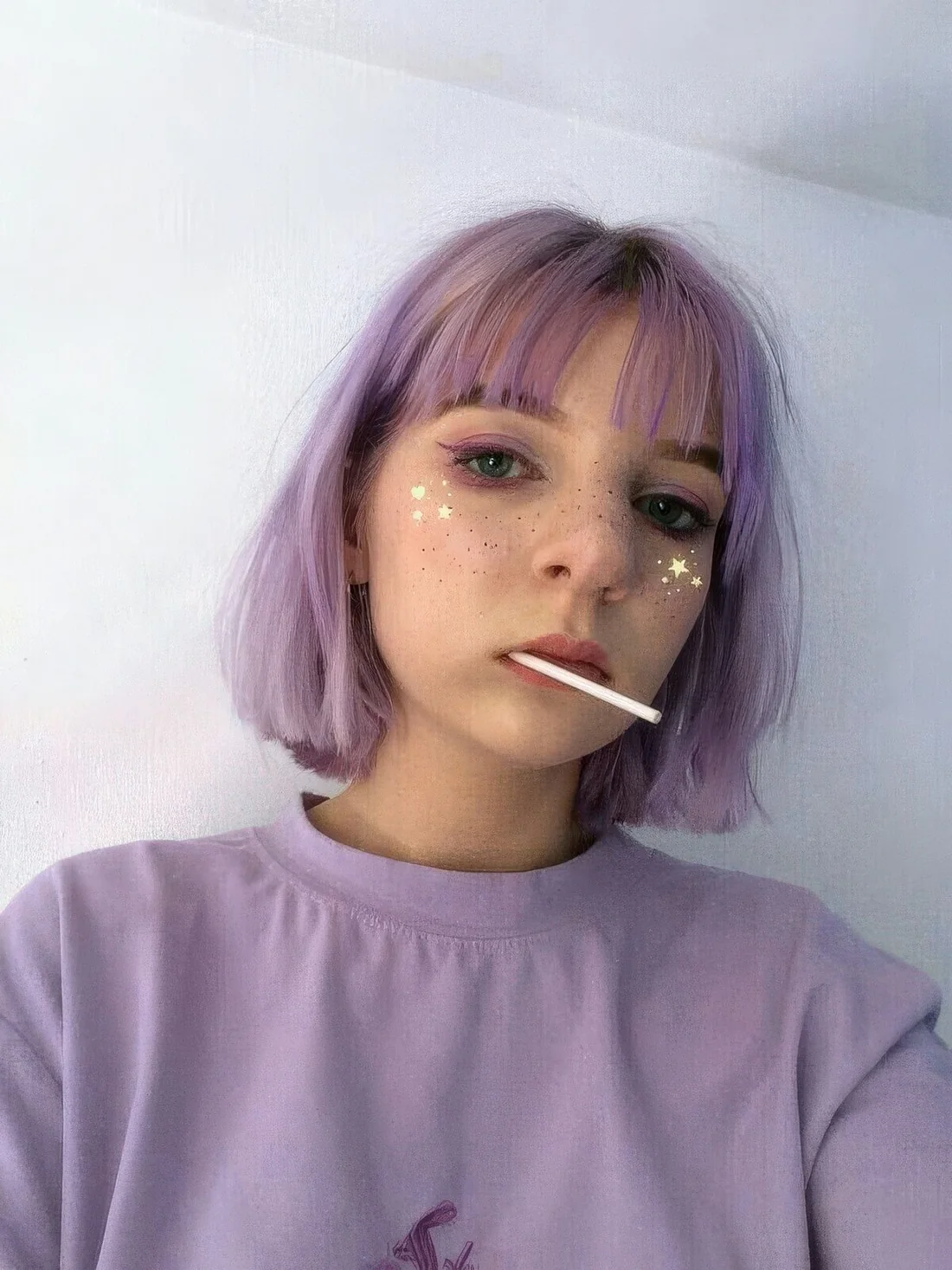 Lilac midi bob with wispy bangs and a bit of texture.
