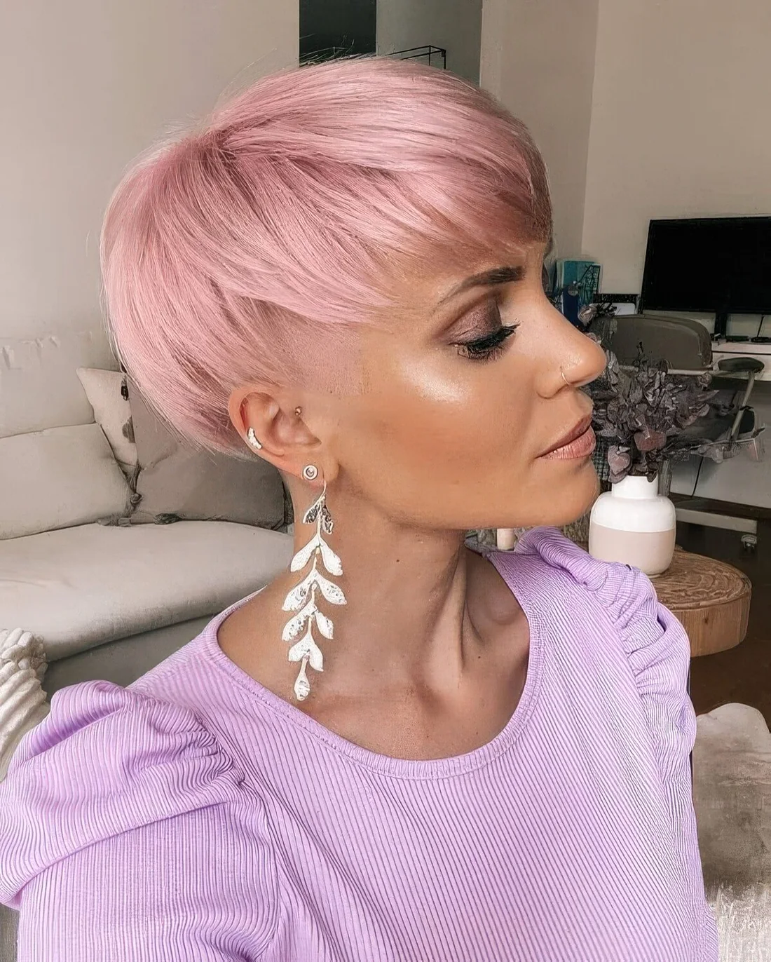 Pink long pixie with fringe and layers.