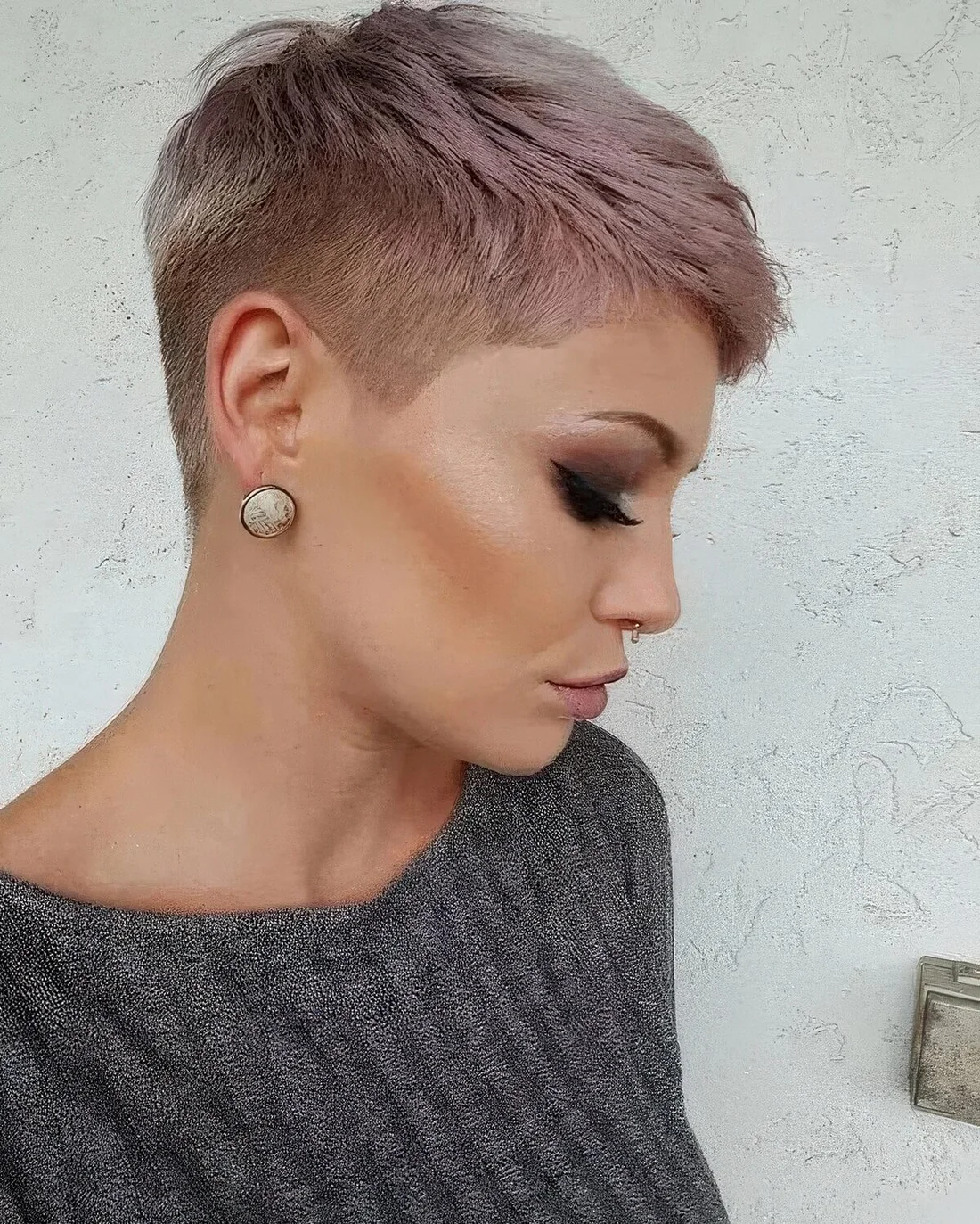 Lilac short pixie with an undercut.