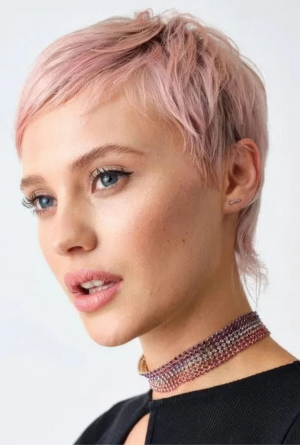 Pink pixie cut with a bit of texture.