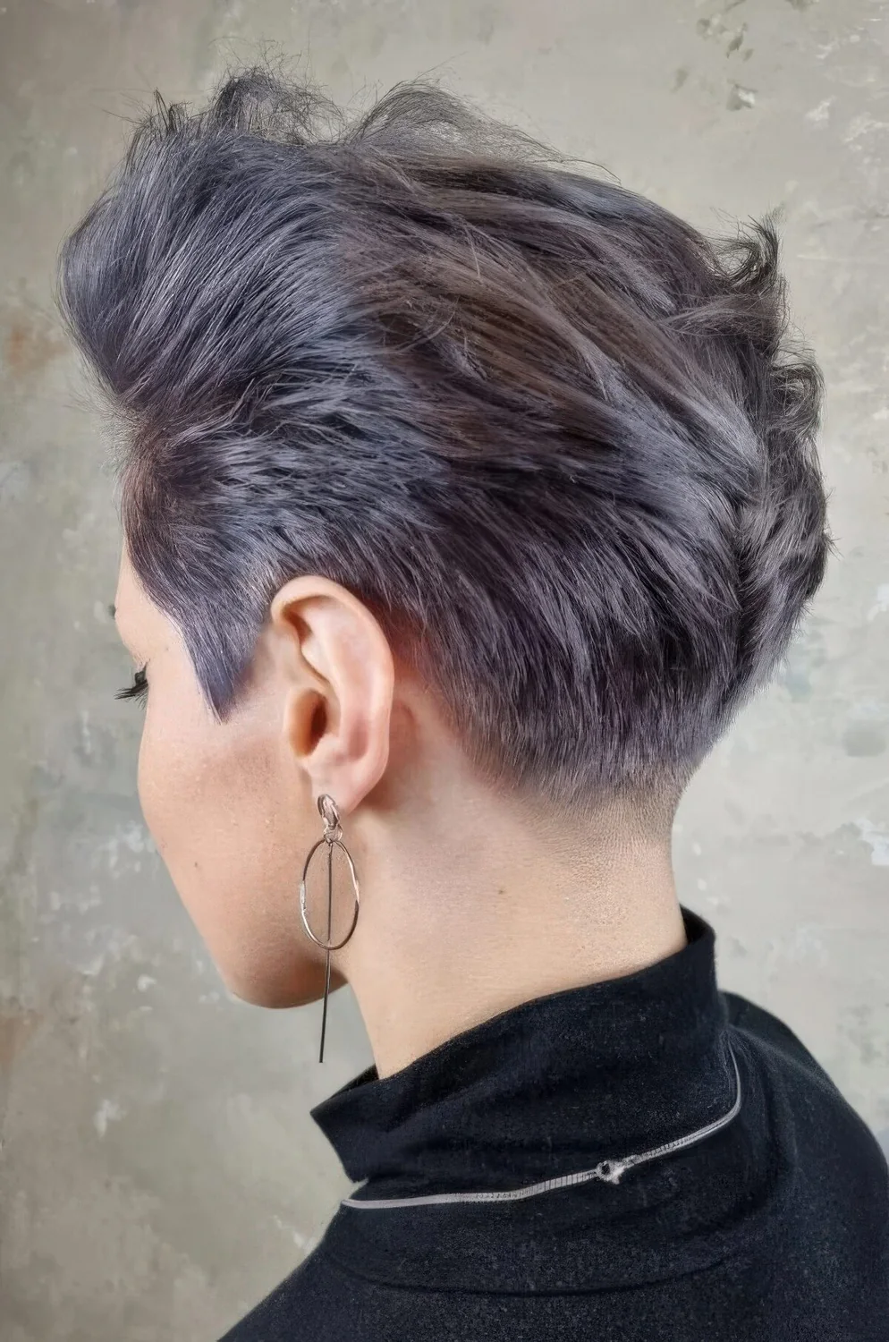Photo showing lilac long pixie, with the hairstyle clearly visible.