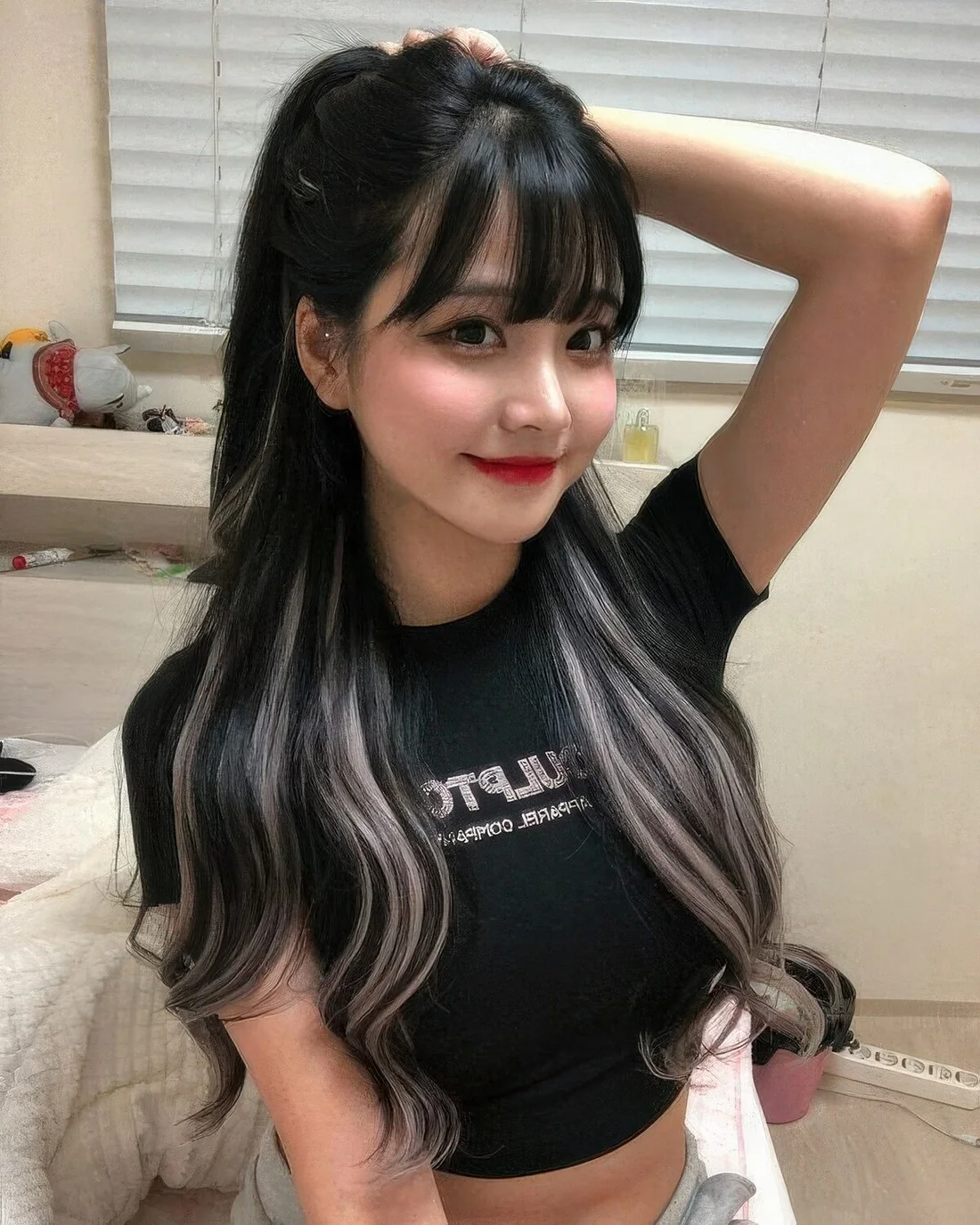 Photo showing long piecey bangs with accents, with the hairstyle clearly visible.