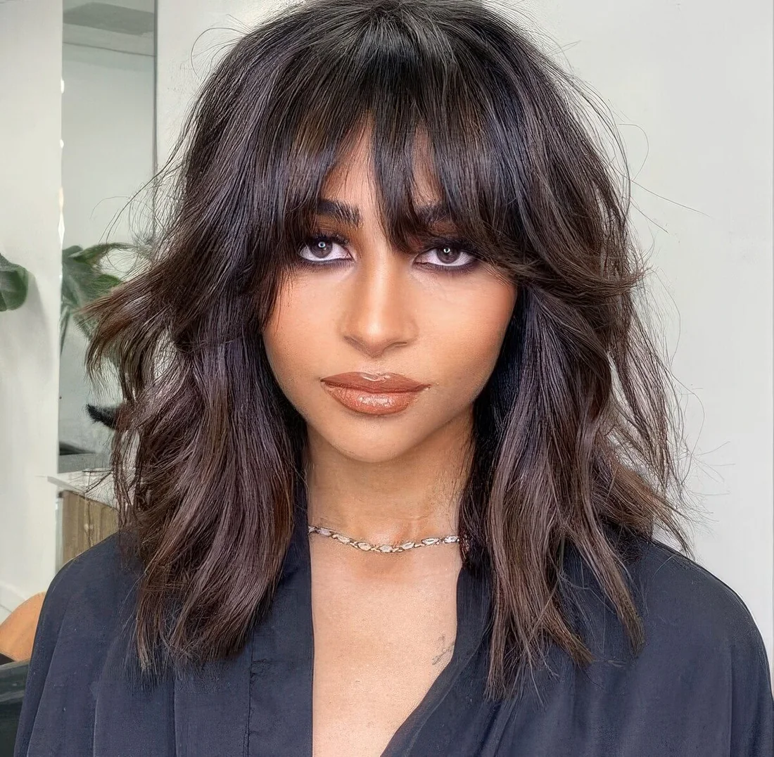 Photo showing medium butterfly piecey, with the hairstyle clearly visible.
