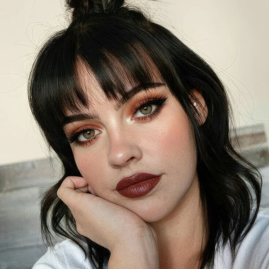Photo showing medium hair piecey bangs, with the hairstyle clearly visible.
