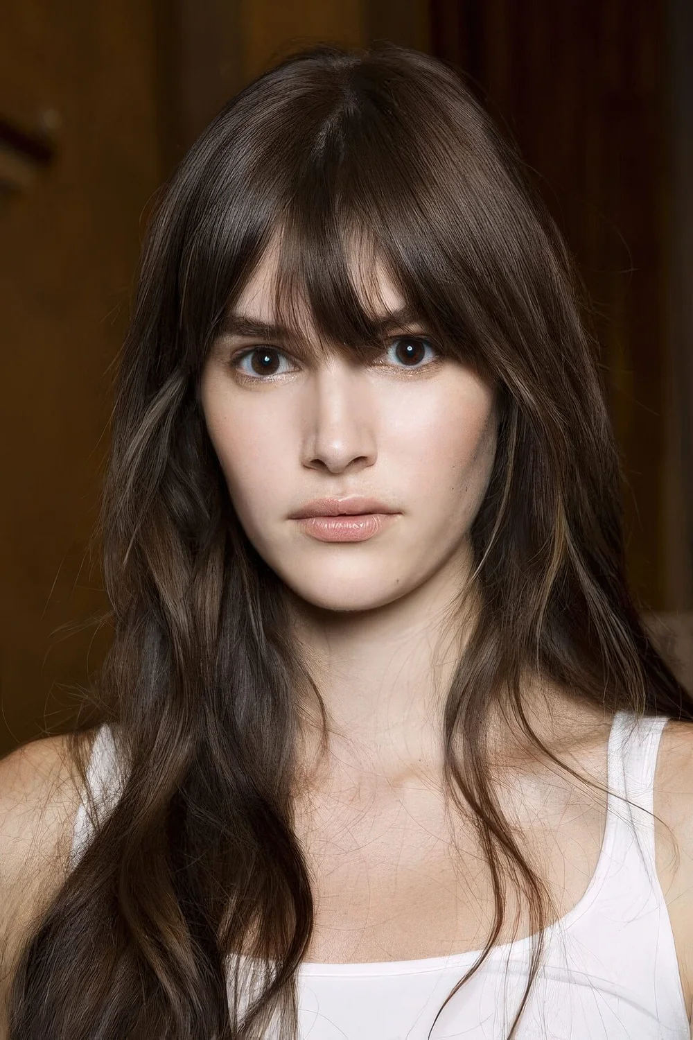 Photo showing piecey bangs long hair, with the hairstyle clearly visible.