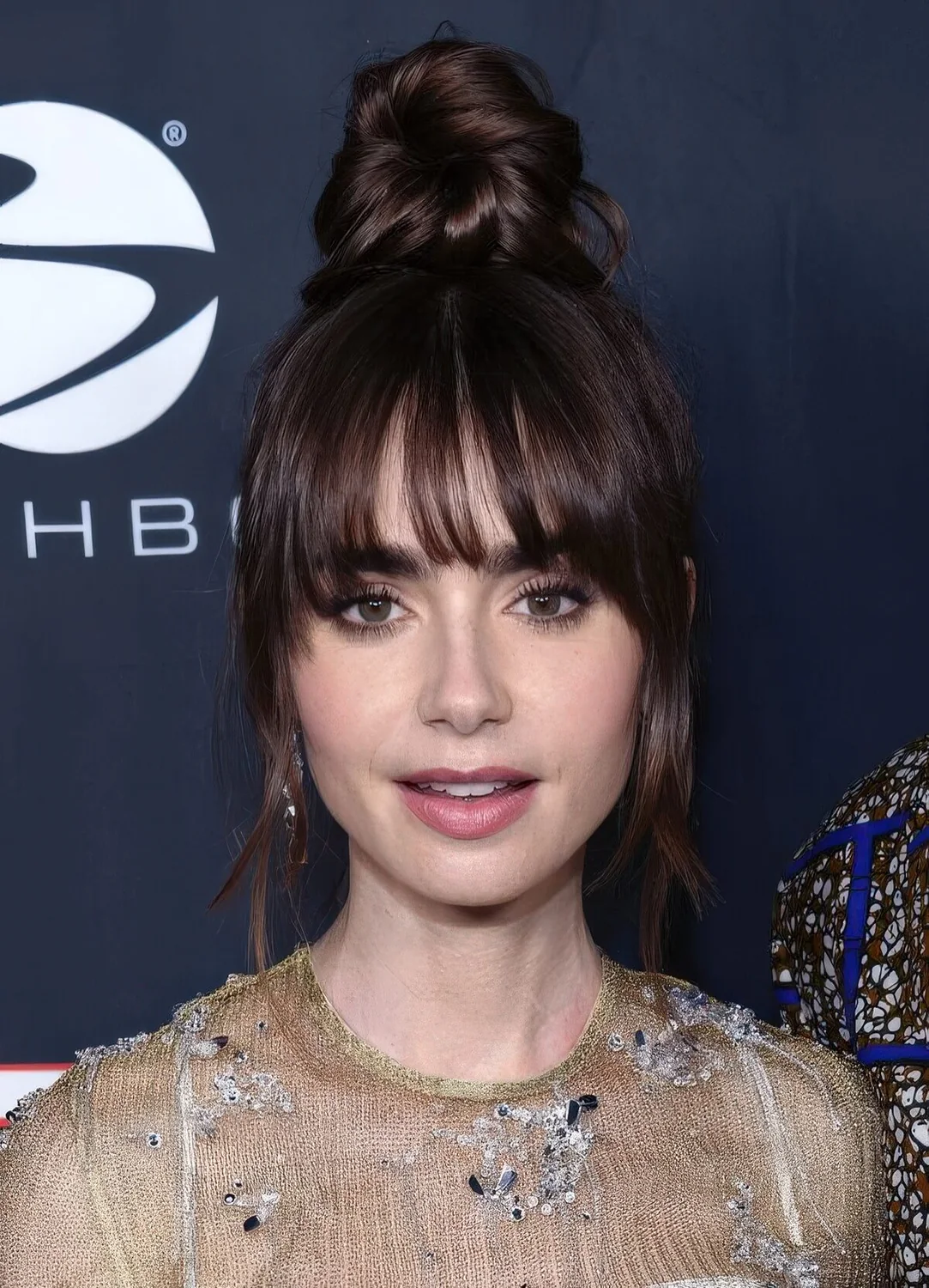 Photo showing piecey bangs to accent the eyes, with the hairstyle clearly visible.
