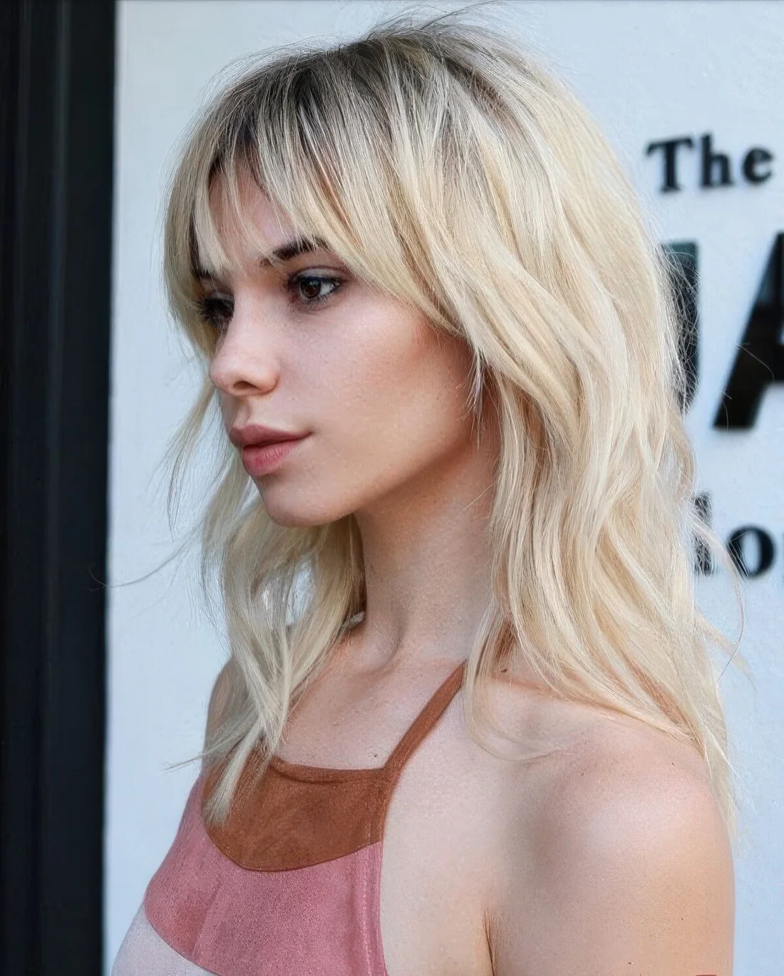 Photo showing shaggy blonde cut piecey, with the hairstyle clearly visible.