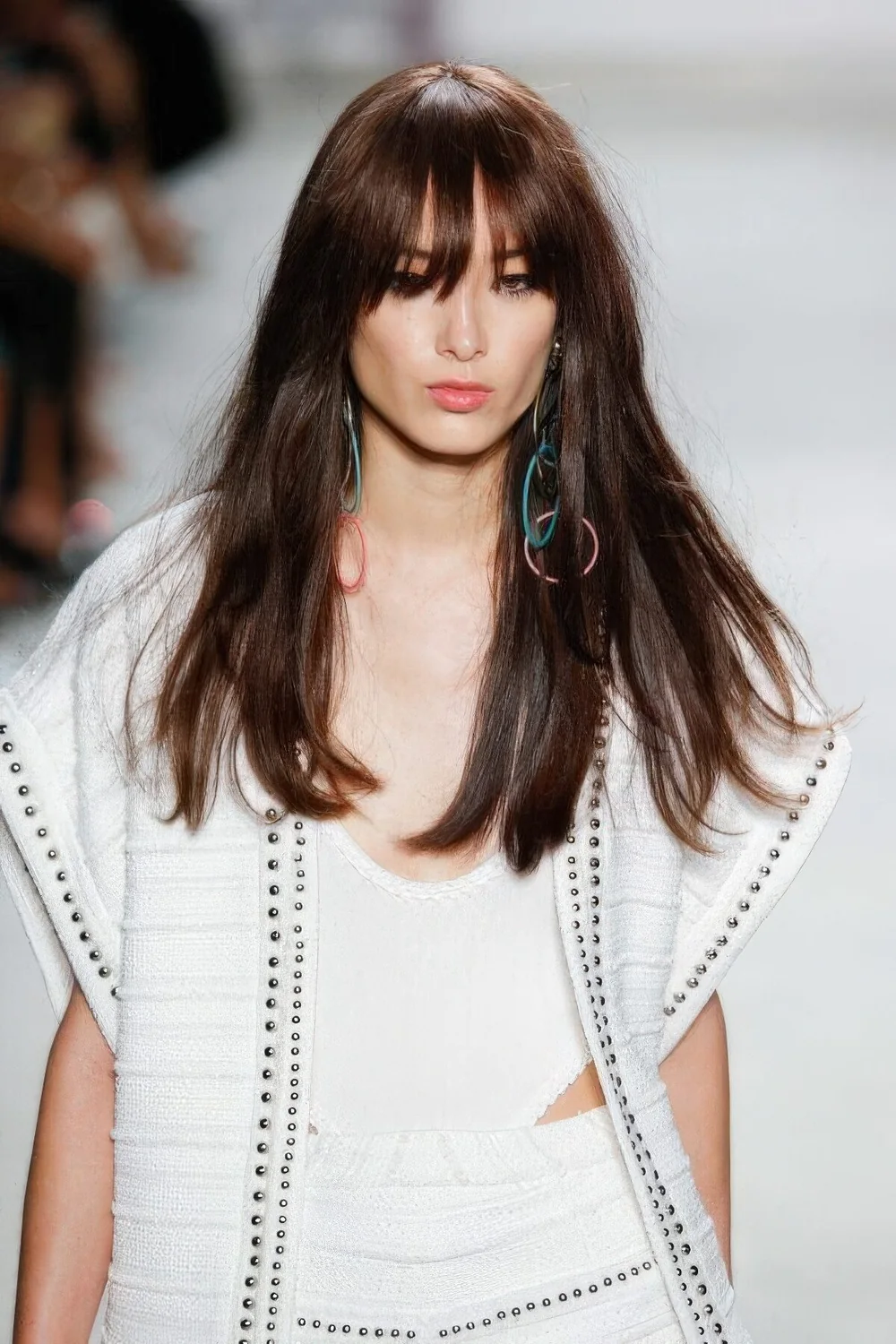Photo showing shaggy cut, piecey bangs, with the hairstyle clearly visible.