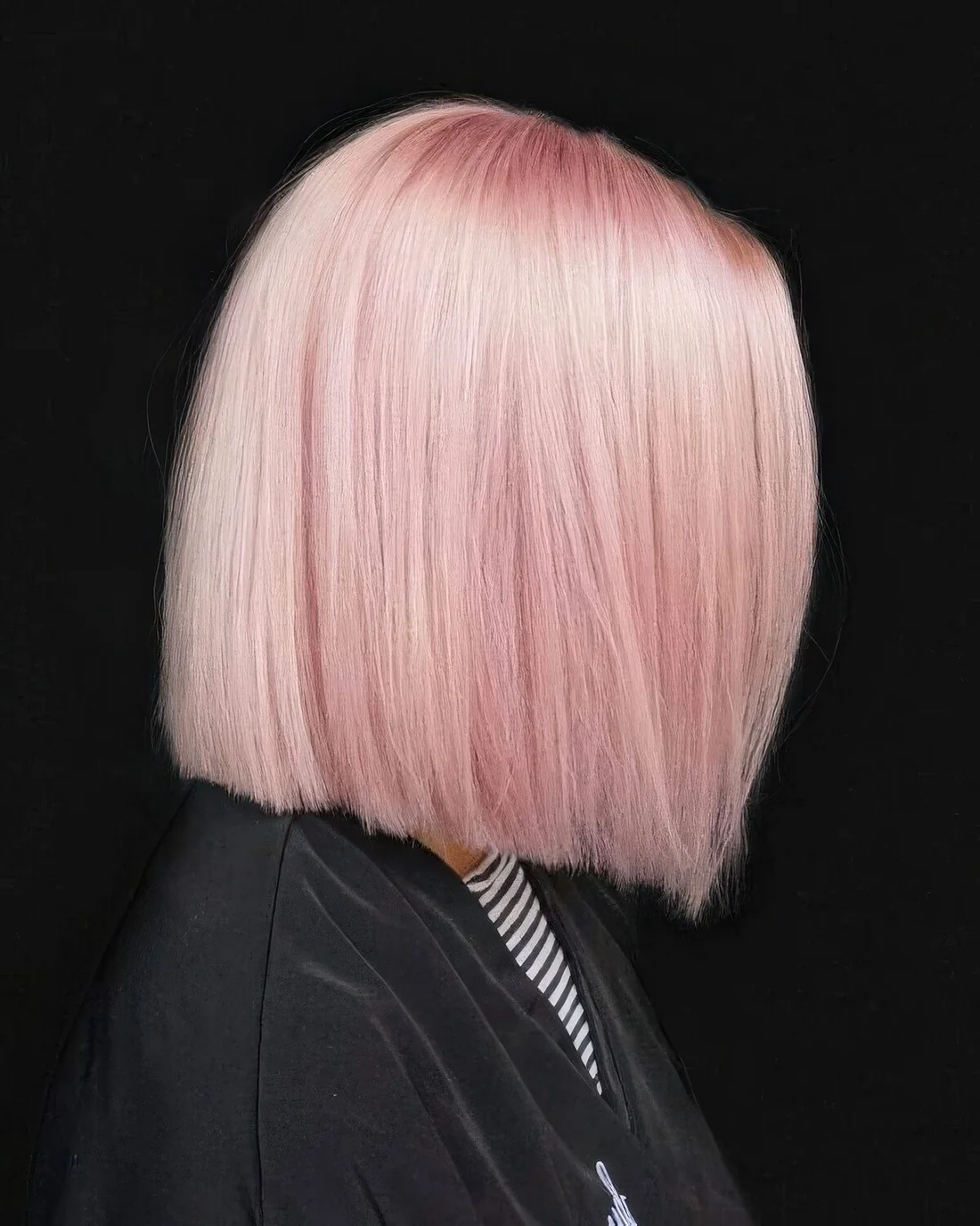 Light pink straight long bob with shiny and chic hair.