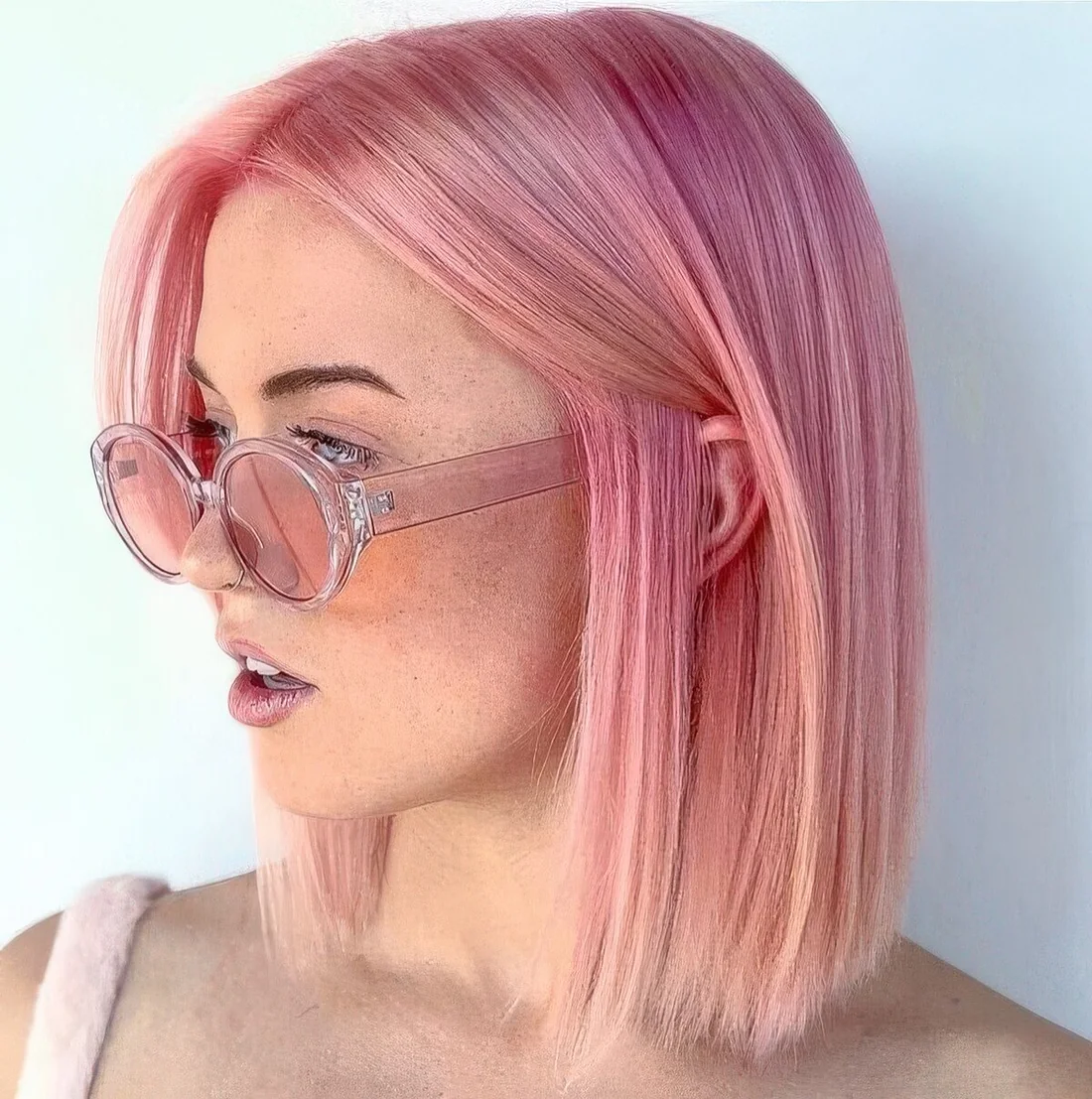 Bubblegum pink lob with a slight ombre effect, lighter ends.