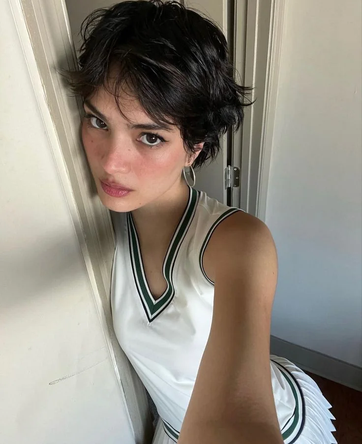 Photo showing black shaggy pixie, with the hairstyle clearly visible.