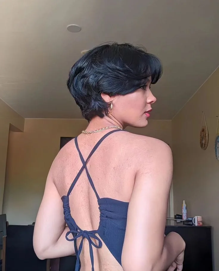 Photo showing curtain bangs, with the hairstyle clearly visible.