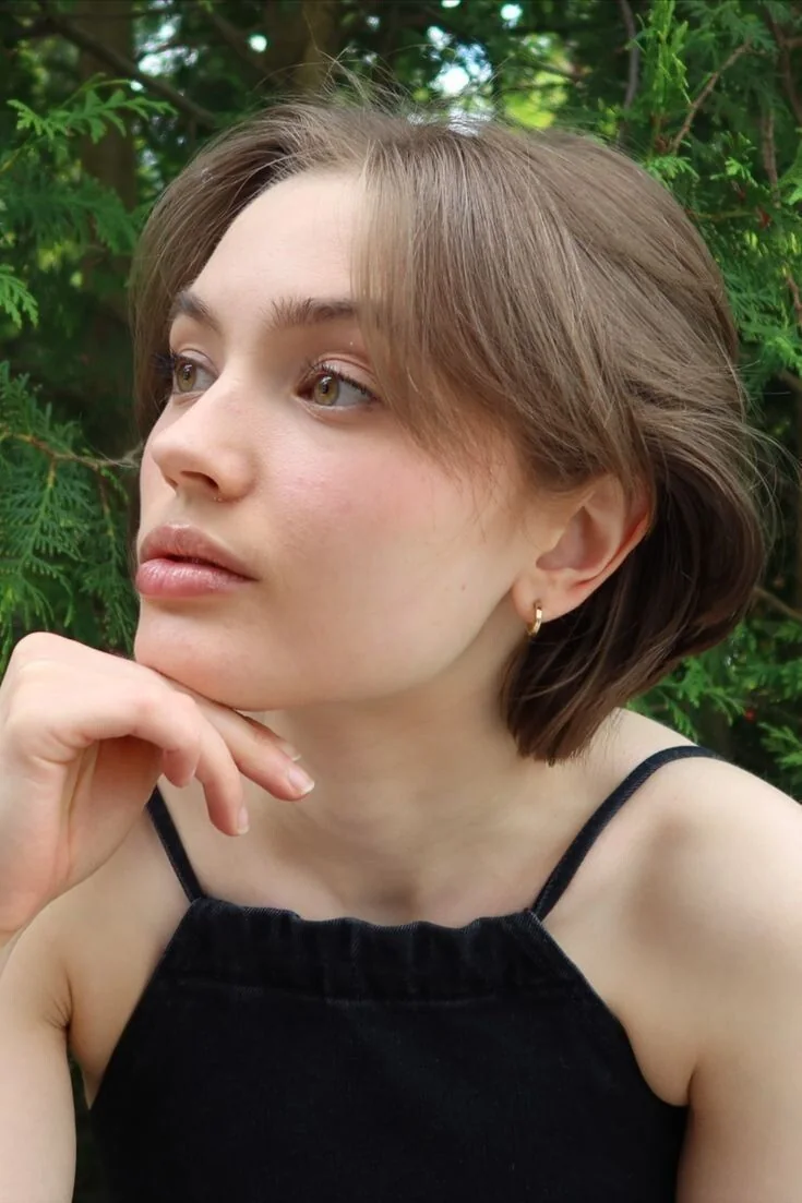 Photo showing pixie bangs, with the hairstyle clearly visible.