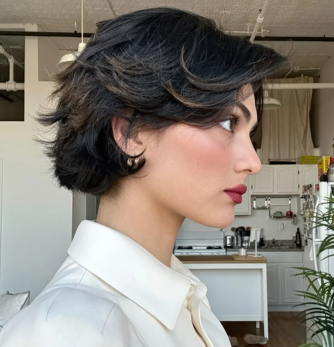 Photo showing black pixie highlights, with the hairstyle clearly visible.