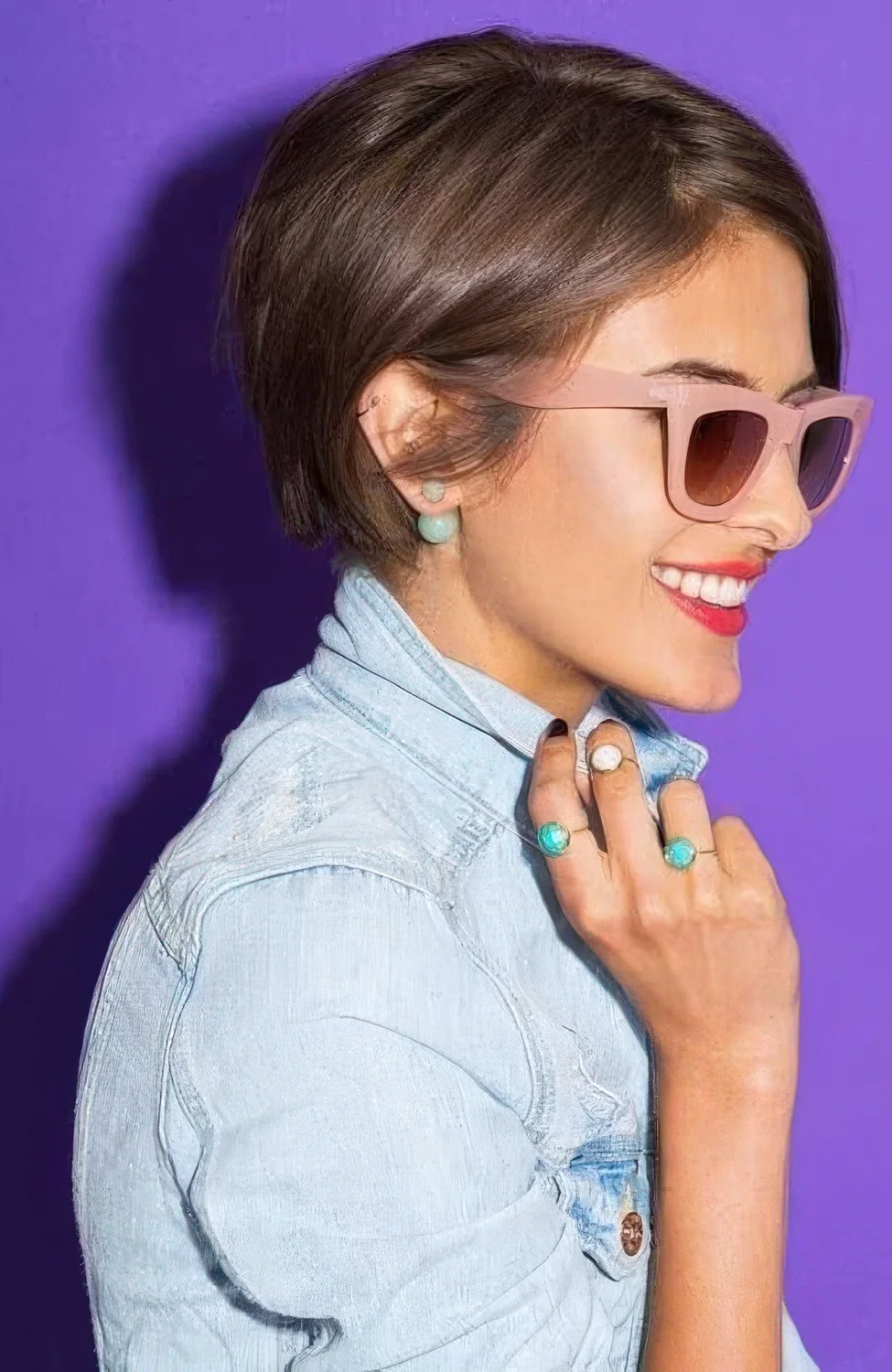 Photo showing brunette pixie bob, with the hairstyle clearly visible.