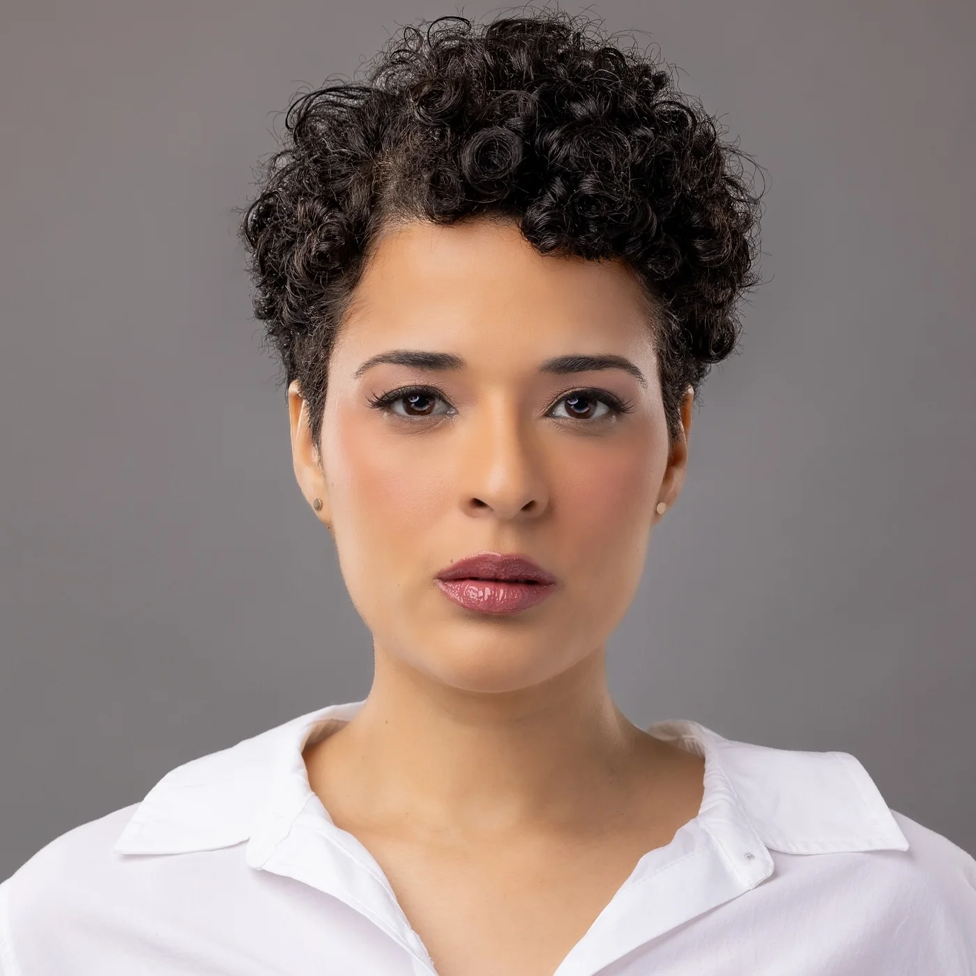 ear curly black curly style with curly fringe fringe shown as a pixie with bangs idea