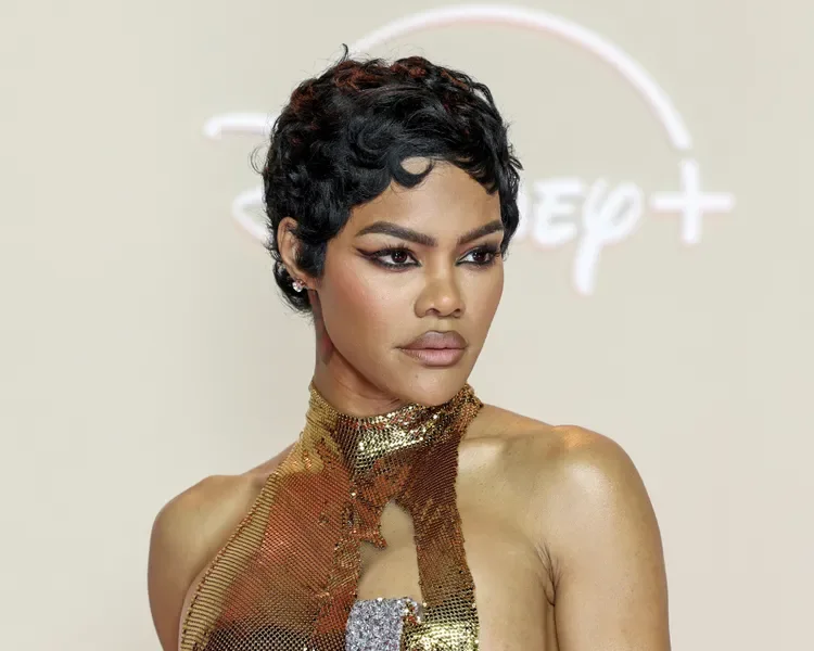 ear straight black pixie with side swept fringe shown as a pixie with bangs idea, featuring ear outline