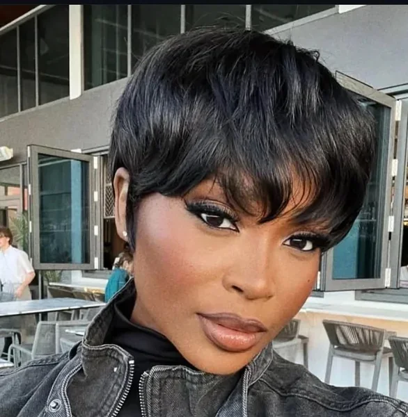 ear straight chestnut pixie with side swept fringe shown as a pixie with bangs idea
