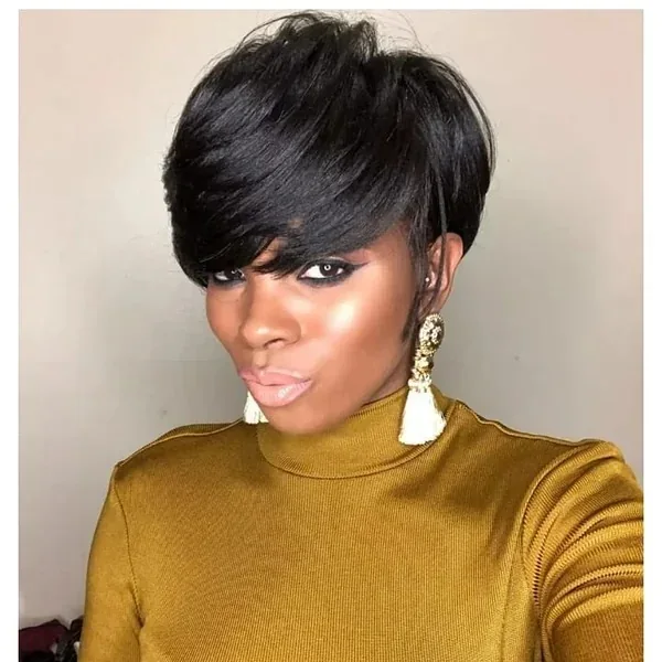 ear coily black pixie with side swept fringe shown as a pixie with bangs idea, featuring side swept fringe