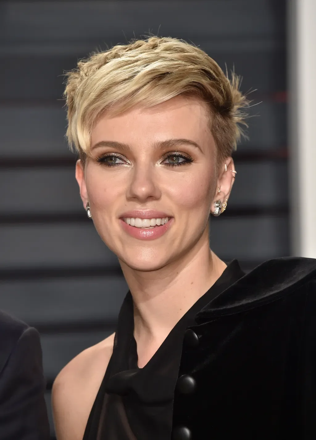 ear straight golden pixie with wispy fringe shown as a pixie with bangs idea, featuring textured finish, shown in soft blonde wispy pixie