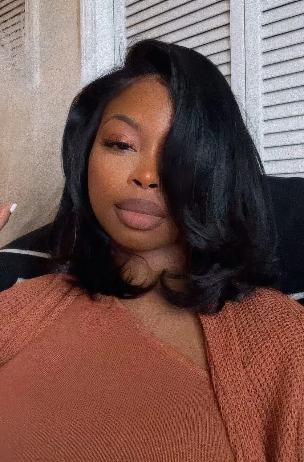 Photo showing black shoulder bob, with the hairstyle clearly visible.