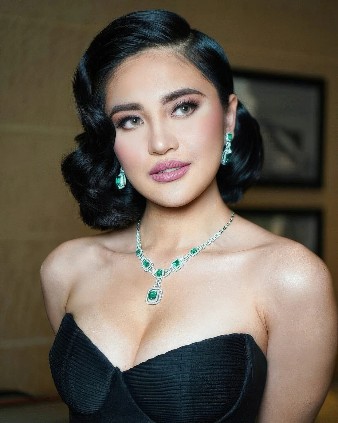 Photo showing glam black bob, with the hairstyle clearly visible.